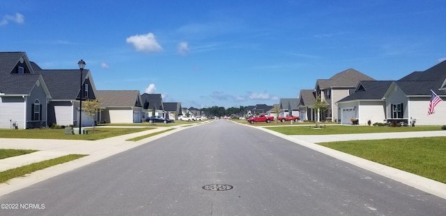 2040 Bluewater Blvd, New Bern, NC 28562 - view of asphalt road featuring a residential view