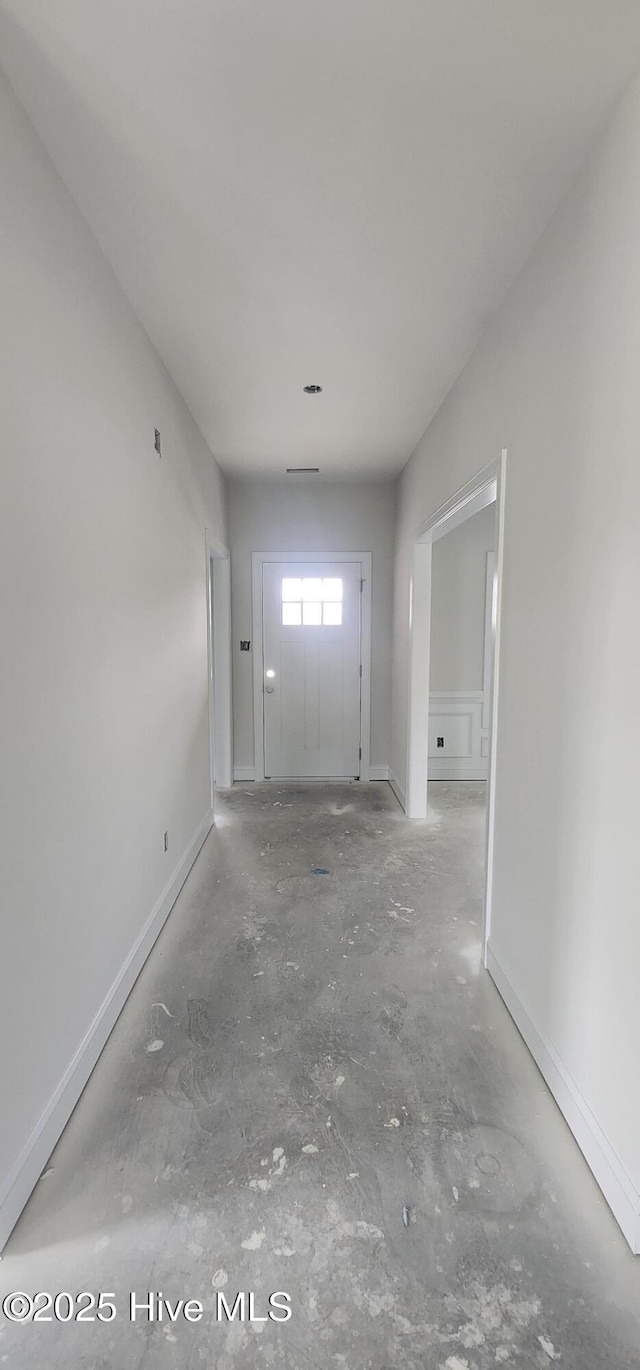 2040 Bluewater Blvd, New Bern, NC 28562 - corridor with unfinished concrete floors and baseboards