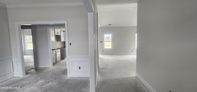 2040 Bluewater Blvd, New Bern, NC 28562 - hall with ornamental molding, healthy amount of natural light, and concrete flooring
