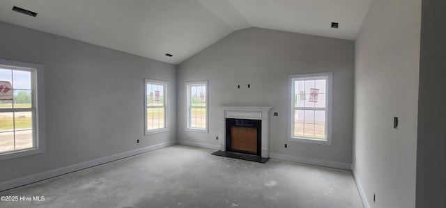 2040 Bluewater Blvd, New Bern, NC 28562 - unfurnished living room with vaulted ceiling, a fireplace, and concrete floors