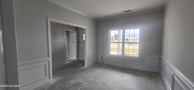 2040 Bluewater Blvd, New Bern, NC 28562 - spare room with a wainscoted wall and ornamental molding