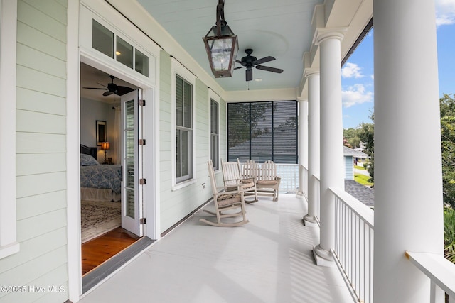 exterior space with ceiling fan