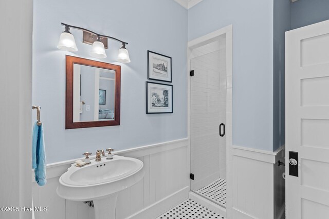 bedroom with ceiling fan, light wood-type flooring, and crown molding