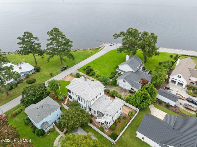 birds eye view of property featuring a water view