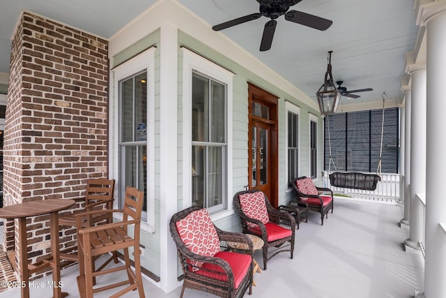 view of patio with a porch and ceiling fan