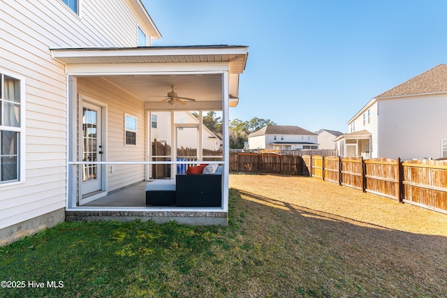 view of yard featuring ceiling fan