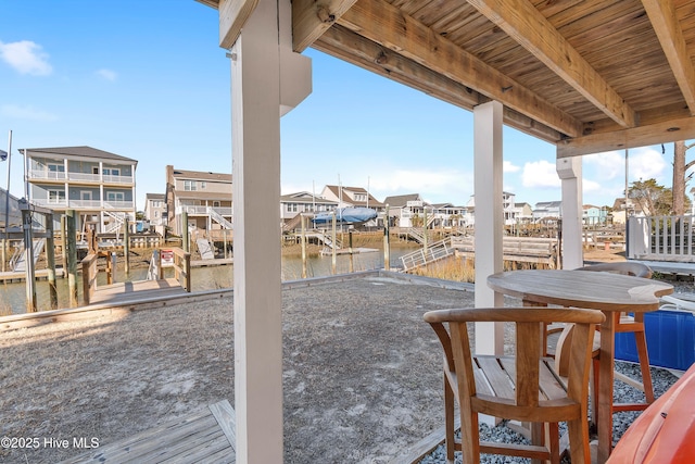 view of patio / terrace with a water view