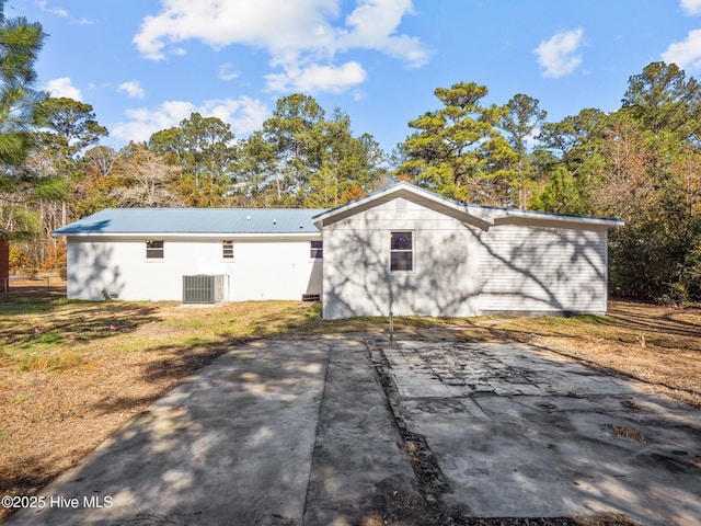 back of house featuring a patio and central AC