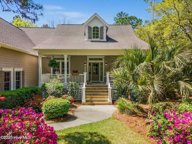 552 Glenmora Ave SW, Supply, NC 28462 - property entrance featuring a porch and roof with shingles