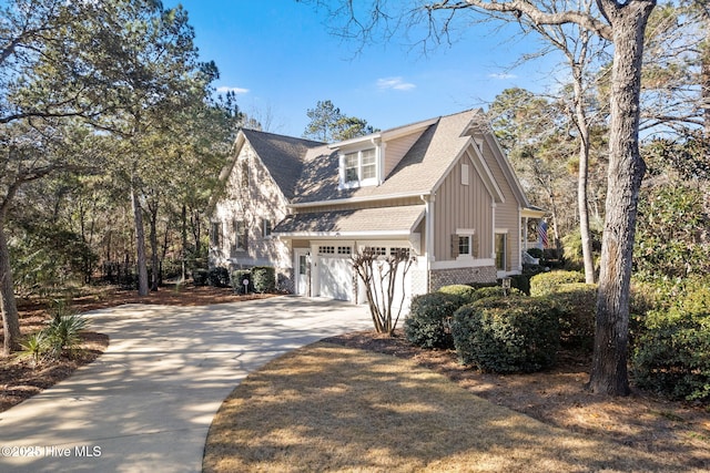 view of side of home with a garage