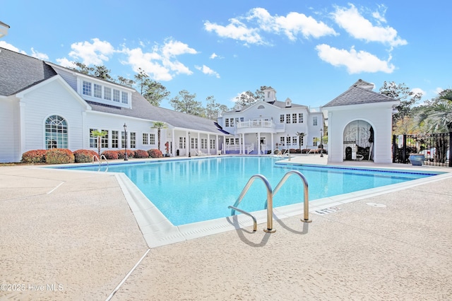 view of swimming pool featuring a patio area