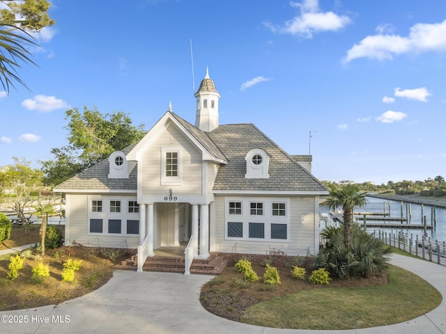 view of property with a water view