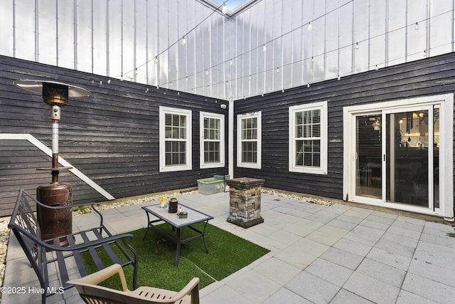 view of patio featuring an outdoor fire pit