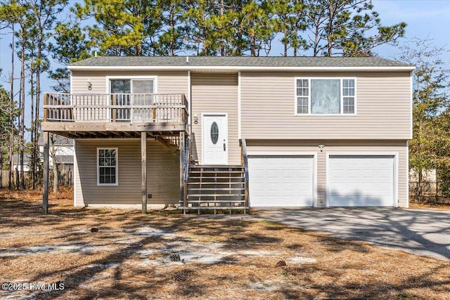 bi-level home featuring a garage