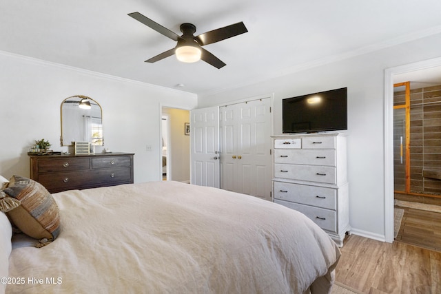 bedroom with light wood-type flooring, ceiling fan, and ornamental molding