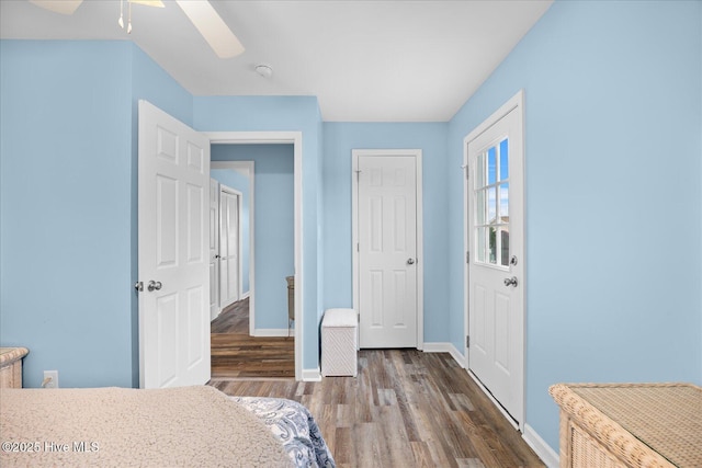 bedroom featuring dark hardwood / wood-style floors and ceiling fan