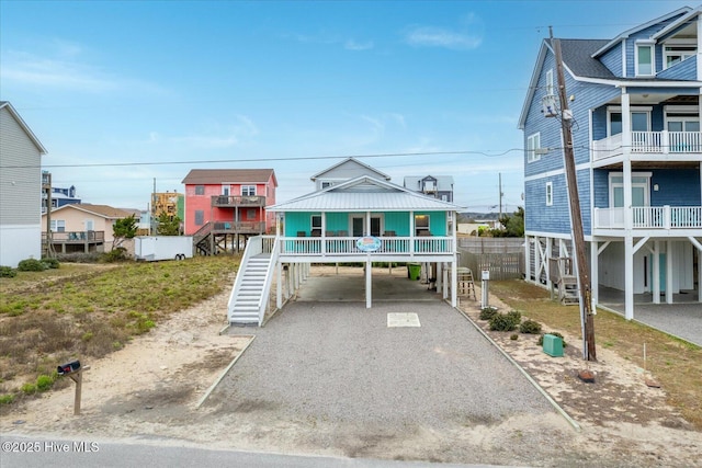 raised beach house with a porch