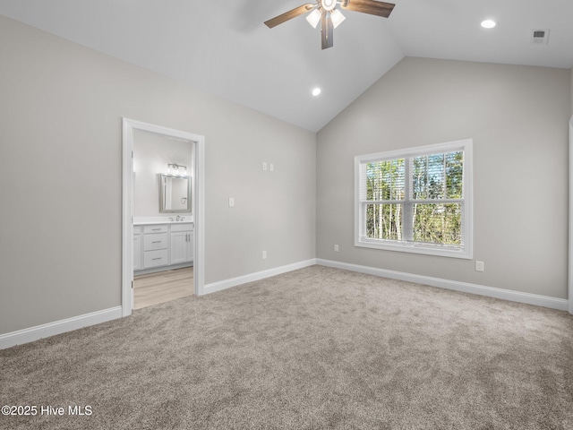 unfurnished bedroom with recessed lighting, lofted ceiling, visible vents, and light carpet
