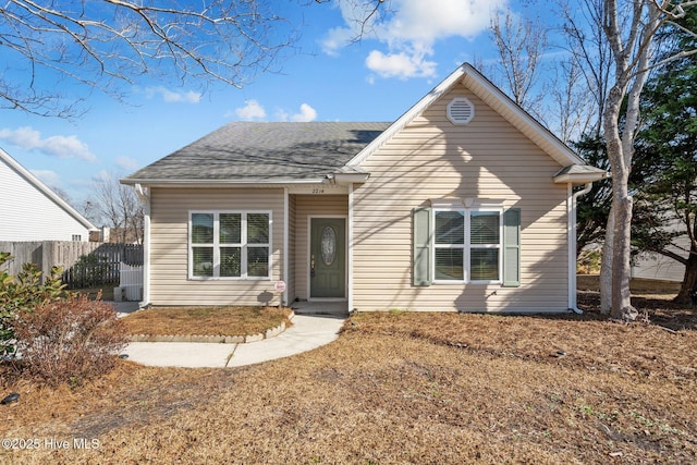 view of front of home with a front lawn