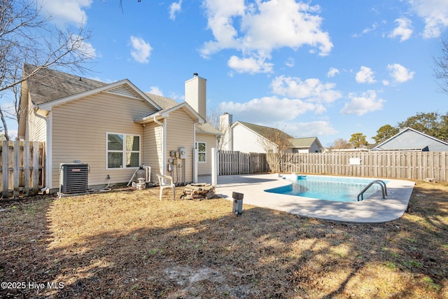 2214 Splitbrook Ct, Wilmington, NC 28411 - rear view of property with cooling unit, a chimney, a patio area, and a fenced backyard
