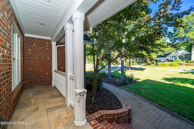 view of patio featuring a porch