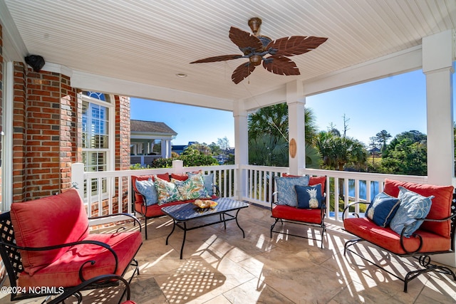 view of patio with ceiling fan and outdoor lounge area