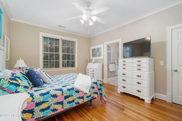 bedroom with ornamental molding, ceiling fan, and light hardwood / wood-style flooring