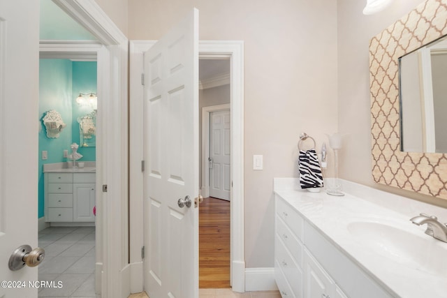 bathroom with vanity and tile patterned flooring