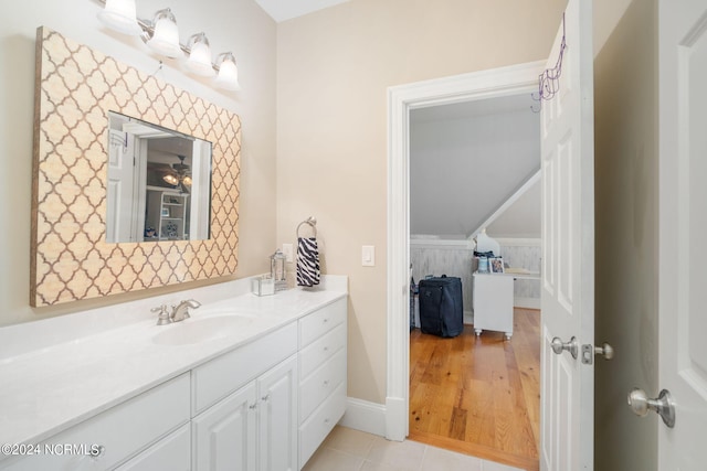 bathroom with vanity and tile patterned flooring