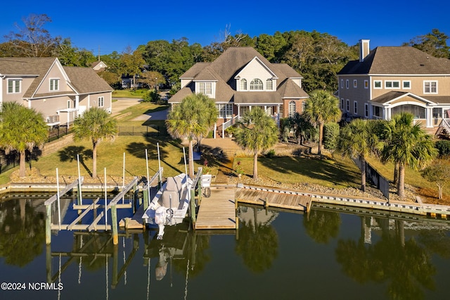 exterior space with a water view