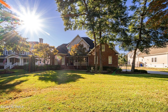 view of front of home with a front yard