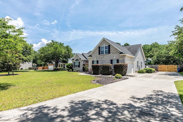 220 Everett Yopp Dr, Sneads Ferry, NC 28460 - traditional home featuring concrete driveway and brick siding