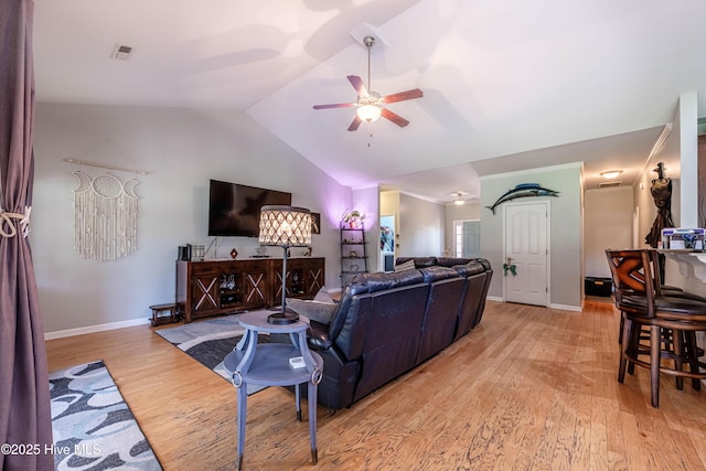 220 Everett Yopp Dr, Sneads Ferry, NC 28460 - living room with a ceiling fan, light wood-style flooring, and vaulted ceiling