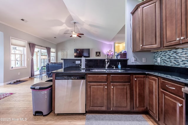 220 Everett Yopp Dr, Sneads Ferry, NC 28460 - kitchen featuring dishwasher, open floor plan, a peninsula, vaulted ceiling, and a ceiling fan