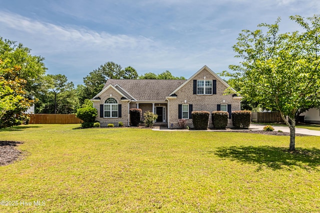 220 Everett Yopp Dr, Sneads Ferry, NC 28460 - view of front of property featuring brick siding and roof with shingles