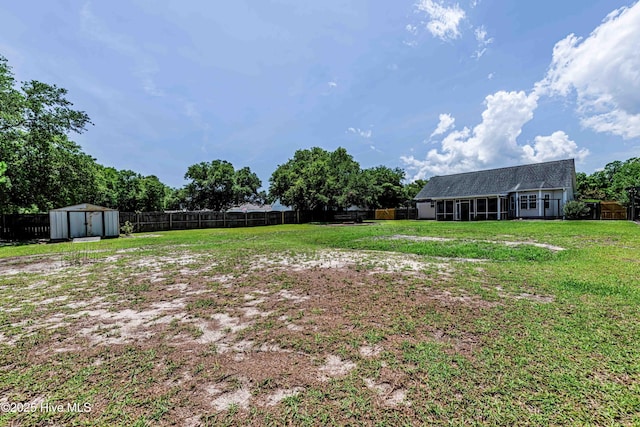 220 Everett Yopp Dr, Sneads Ferry, NC 28460 - fenced backyard with a storage shed