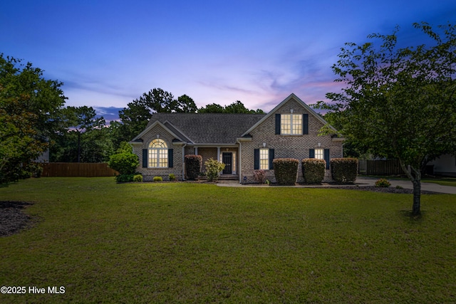 220 Everett Yopp Dr, Sneads Ferry, NC 28460 - view of front of home featuring brick siding and roof with shingles