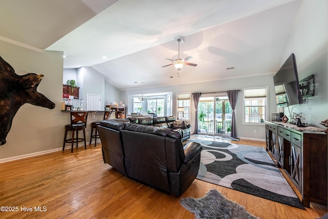 220 Everett Yopp Dr, Sneads Ferry, NC 28460 - living area with lofted ceiling, light wood-style flooring, healthy amount of natural light, a ceiling fan, and ornamental molding
