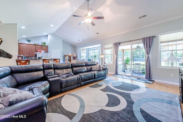 220 Everett Yopp Dr, Sneads Ferry, NC 28460 - living area featuring a ceiling fan, light wood-type flooring, lofted ceiling, and ornamental molding