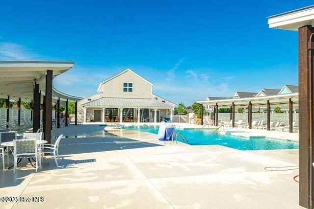 435 Goldeneye Ct, Beaufort, NC 28516 - community pool featuring a patio area and fence
