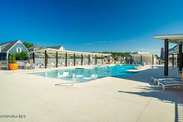 435 Goldeneye Ct, Beaufort, NC 28516 - community pool with a patio area and fence