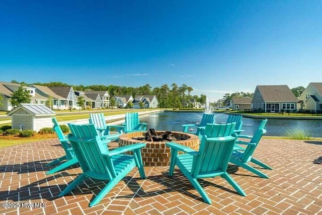 435 Goldeneye Ct, Beaufort, NC 28516 - view of patio with a residential view and an outdoor fire pit