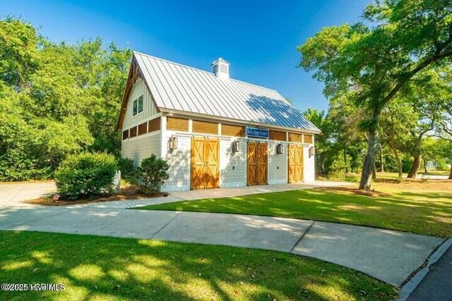 435 Goldeneye Ct, Beaufort, NC 28516 - surrounding community featuring a lawn