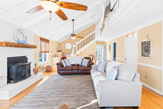 27 Newport St, Ocean Isle Beach, NC 28469 - living area featuring ceiling fan, light wood-type flooring, and stairs