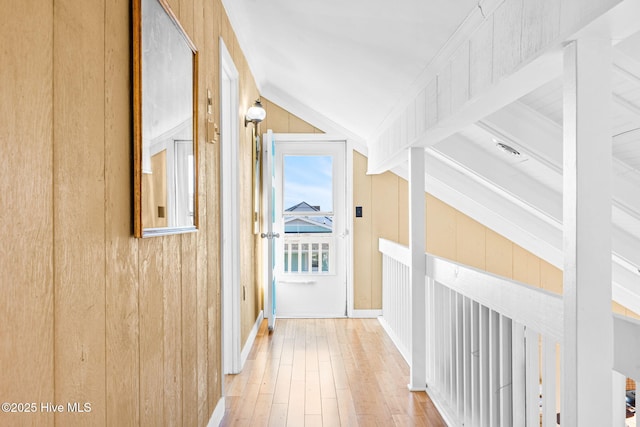 27 Newport St, Ocean Isle Beach, NC 28469 - hallway with vaulted ceiling, wood finished floors, and baseboards
