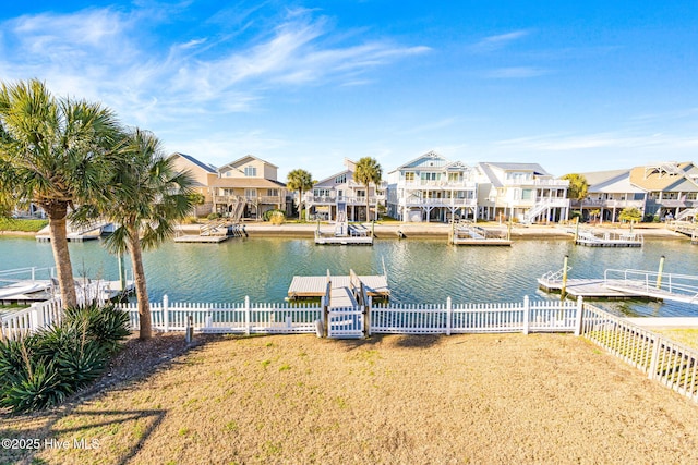 27 Newport St, Ocean Isle Beach, NC 28469 - dock area with a residential view and a water view