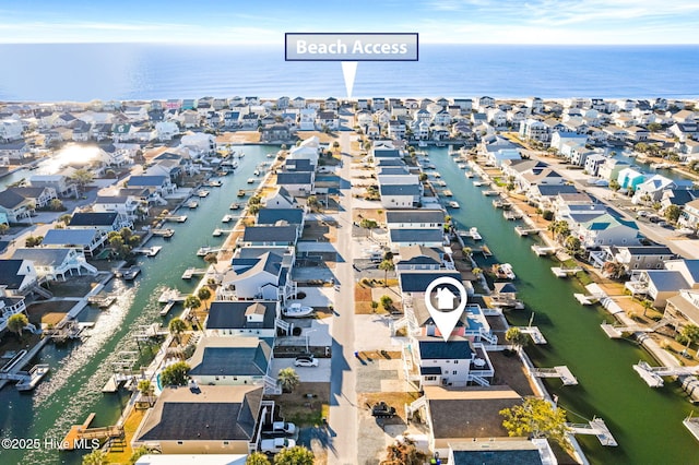 27 Newport St, Ocean Isle Beach, NC 28469 - aerial view of property's location with a large body of water and nearby suburban area