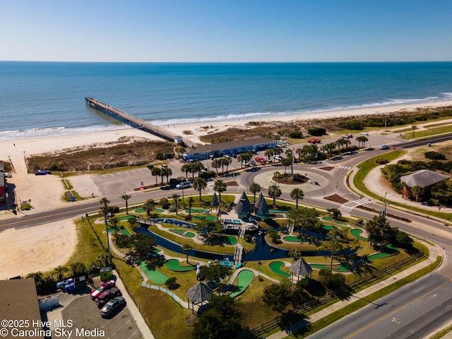 bird's eye view featuring a beach view and a water view