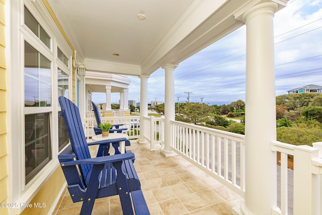 116 Salter Path Rd Unit 102Seabrook, Pine Knoll Shores, NC 28512 - balcony with covered porch