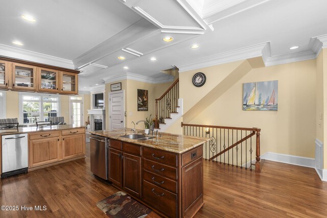 116 Salter Path Rd Unit 102Seabrook, Pine Knoll Shores, NC 28512 - kitchen with crown molding, a sink, a fireplace, stainless steel dishwasher, and dark wood finished floors